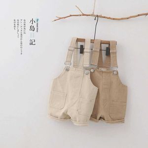 Overalls casual babyjongen solide denim top met 2 zakken ontwerpen peuter jeans ophanging broek baby meisje jumpsuit Koreaanse kinderen kleding d240515