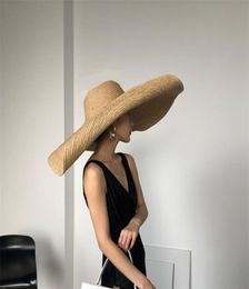 Негабаритные пляжные шляпы для женщин. Простые однотонные летние широкие поля. Большая соломенная шляпа с защитой от ультрафиолета. Складная солнцезащитная кепка Chapeau Femme 214897269.