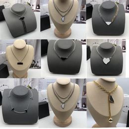 P home luxurys Vente Pendentif Colliers Mode pour Homme Femme 48cm Triangle inversé designers marque Bijoux hommes femmes Hautement Qualité 68