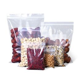 Sacs d'emballage 100 paquets de stockage anti-poussière 10 sacs en plastique transparents refermables en soie adaptés aux bijoux Bonbons Coin Otvmt