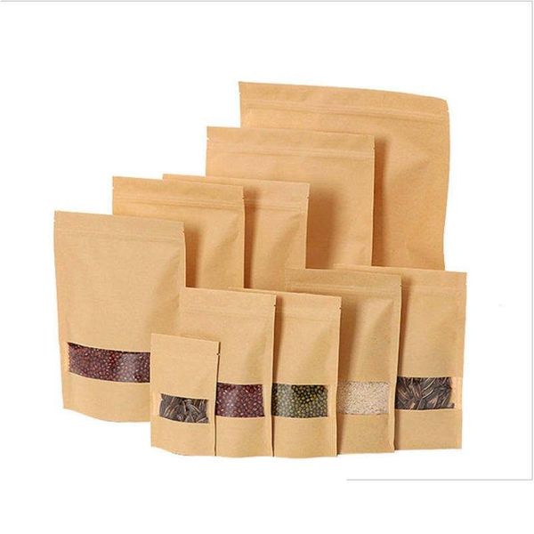 Sacs d'emballage en gros papier kraft brun fenêtre transparente fermeture à glissière au détail Mylar Stand Up pochette pour collation bonbons grains de café en poudre Noël Dhfmo