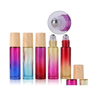 Bouteilles d'emballage Rouleau de rouleau de verre épais de 10 ml sur la bouteille avec capuchon en plastique de grain de bois et couleur de dégradé de boule en acier inoxydable pour Essential O Ot2R5