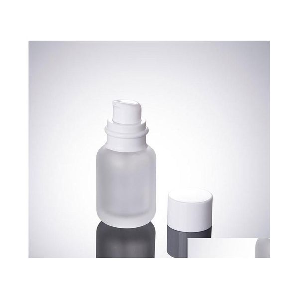 Bouteilles d'emballage 50Ml Frost Glass Cosmetic 1.7Oz Lotion 50Cc Press Bottle White Cap Empty Sn905 Drop Delivery Office School Business Dhuum