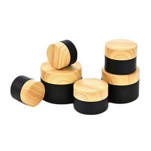 Bouteilles d'emballage 5G 10G 15G 20G 30G 50G Pots cosmétiques en verre dépoli noir Bouteille de crème Récipient rechargeable avec du bois en plastique imité Ot7Qw