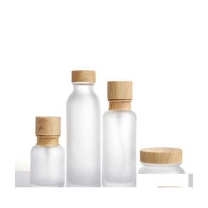 Verpakking flessen Frosted Glass Jar Lotion Crème Ronde Cosmetische potten Hand Face Pump Fles met houten graan Capmeti Druppel Afgifte O DH4ZX