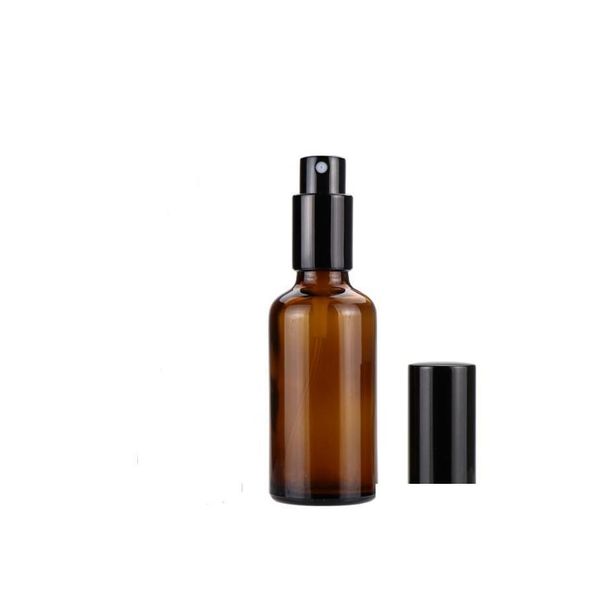 Bouteilles D'emballage Épais 50Ml Verre Ambre Vaporisateur En Gros Bouteille D'huiles Essentielles Avec Pompe Noire Pulvérisateur Or Cap Pour Cosmétiques Par Goutte Dhhke