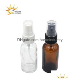 Inpakkende flessen Groothandel 15 ml 30 ml Amber Glass Spray Bottle Essentiële olie per met zwarte of witte cap druppel Delivery Office School Bus Dhbly