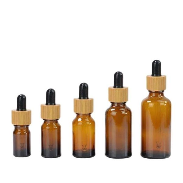 Bouteilles d'emballage en gros de 30 ml 50 ml Bouteille en verre d'ambre transparent avec capuchon de bambou 1 oz de flacons pour la goutse d'huile essentielle Dhig3