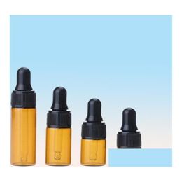 Bouteilles d'emballage en gros capuchon noir capuchon en verre ambre rond 1 ml 2 ml l 5 ml Échantillon d'huile essentielle Conteneur d'huile pour voyager7370047 D dhnhu