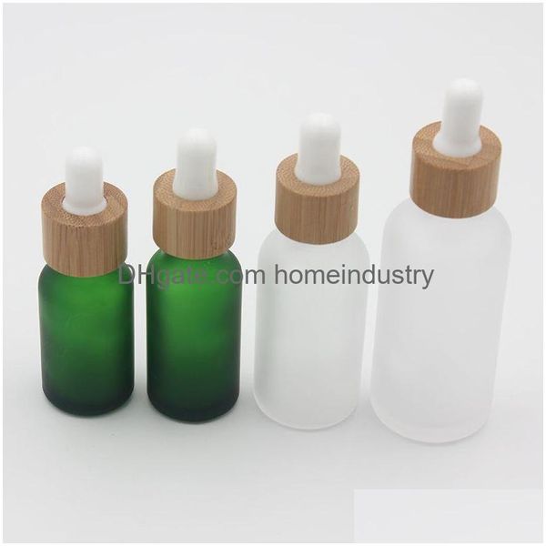 Bouteilles d'emballage bouteille de gouttes en verre transparent de givre en verre transparent 15 ml 20 30 ml avec bambou Coud Coud Huile essentielle de livraison givrée