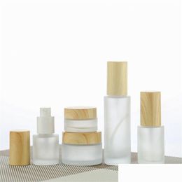 Verpakkingsflessen Groothandel Matglas Zalfpotje Cosmetische Lotion Spuitfles Met Geïmiteerde Houten Deksels Hervulbare Container 20Ml 30M Dhvqs