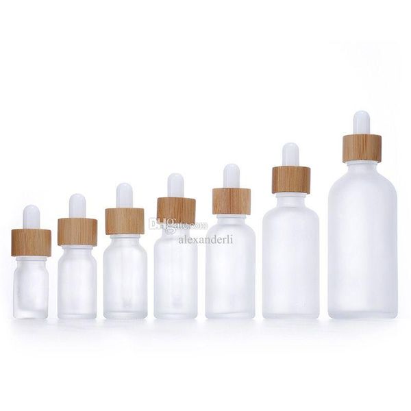 Botellas de embalaje al por mayor de la botella de gotero de vidrio blanco esbelto 10ml 15ml 20ml 30ml 50ml con tapa de bambú 1 oz de aceite esencial de madera Dhh5j