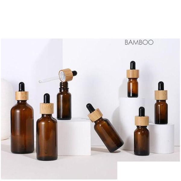 Botellas de embalaje Venta al por mayor Botellas cuentagotas de aceite esencial de vidrio ámbar de madera de bambú natural 10 ml 15 ml 20 ml 30 ml 50 ml Envases cosméticos Dhjod