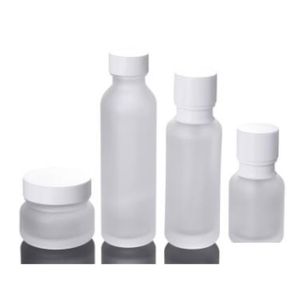 Bouteilles d'emballage Bouteilles d'emballage en gros Pot en verre dépoli Lotion Crème ronde Pots cosmétiques Bouteille de pompe à main avec grain de bois C Dhcnq