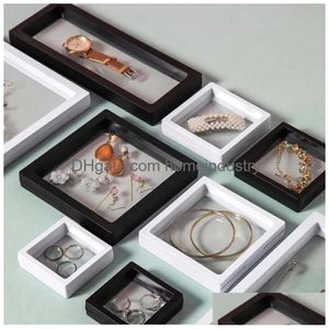 Verpakkingsdozen Colorf Pe Film Sieraden Opbergdoos Ring Bracelet Reiskoffer 3D Floating Frame Dust proof Display Drop Delivery Office DHWSE DHWSE