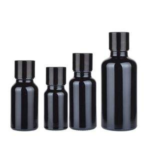 Pakken Lege zwarte glazen fles rond schouder Zwart aluminium schroefdeksel met plug -hervulbare draagbare cosmetische container 5 ml 10 ml 15 ml 20 ml 50 ml 100 ml 100 ml