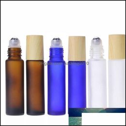 Embalaje Office School Business Industrial10Ml Frosted Clear Blue Amber Roll On Bottles Roller Ball Botella de vidrio con tapa de grano de madera para Es