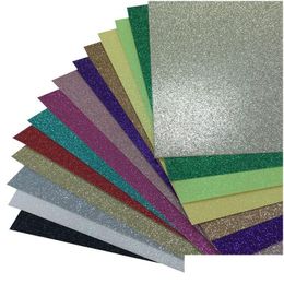 Verpakkingspapier 10 stuks één zak Kerst- en feestdecoratie Glitterpapier Diy Craft 300Gsm Cardstock 220328 Kantoor School Bu Dhgarden Dhmfc