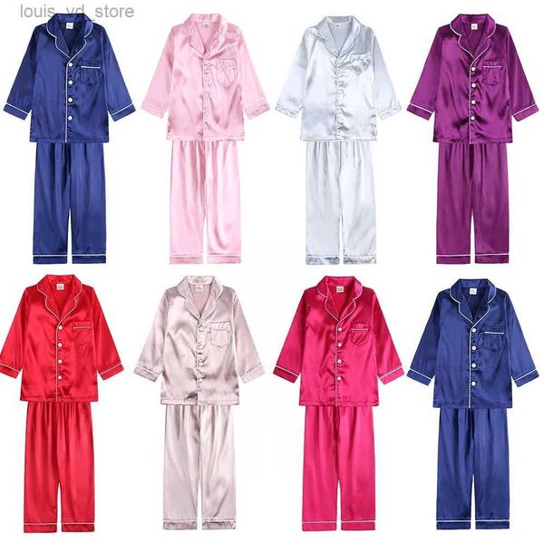 Pajamas 2023 Enfants Enfants Silk Satin Pyjamas Vêtements solides pour garçons Girl Lounge Suit mignon Adolescente Sleeping Family Match Christmas Pjs T240415