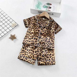 Pyjama's jongens en meisjes kinderpyjama's set cartoon luipaard print korte mouwen t-shirt top baby pyjama's y240530