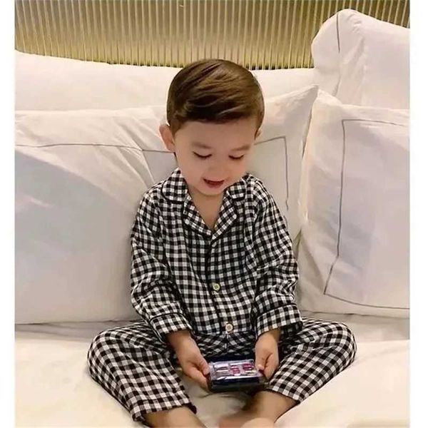 Pajamas Classic Black and White Grid Pyjama Set pour garçons Baby Night Two-Piece Set Summer and Automne Long Mancheved Shirt Topl2405