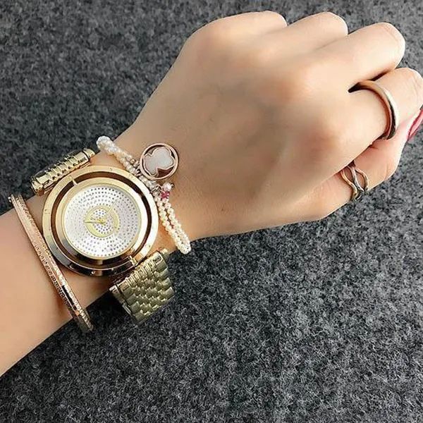 Pan marque de mode montre-bracelet femmes filles cristal peut tourner cadran style acier métal bande montres à Quartz P18