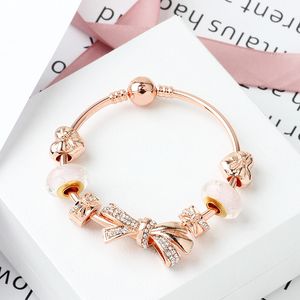 Strands moda rosa oro brillante arco pulsera 18-20 cm amor encanto cristal grano joyería al por mayor