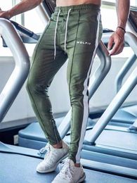 Calças 2023 nova marca de moda de alta qualidade algodão casual magro calças masculinas ginásio treinamento moda jogging pé pant