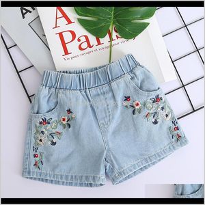 Broek babykleding baby moederschap drop levering 2021 kinderen geborduurde bloemen mode denim shorts meisjes kleding wilde stijl zomer Promotie