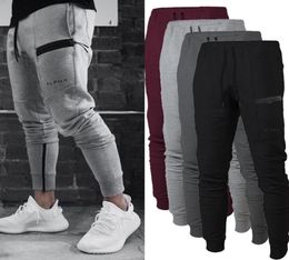 Pantalon Fitness Sport Stretch Cotton Pant Men039s Fitness Jogging Pantalon Body Engineers Jogger Pantals extérieur Pant de travail Pant Sweat P8542426