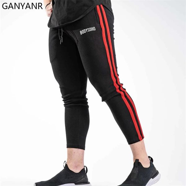 Pantalones ganyanr pantalones jogging hombres deportes de gimnasio corriendo ropa deportiva.