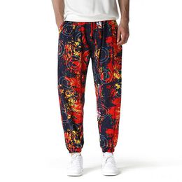 Pantalon Harem pantalon hommes mode motif imprimé cordon cravate taille pantalon pour homme automne décontracté lanterne pantalon mâle Streetwear été