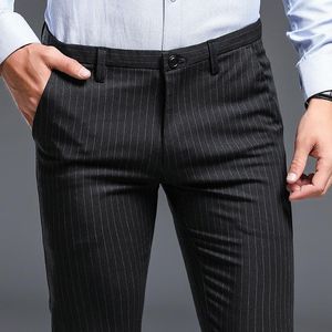 Pantalones ICPANS pantalones de vestir de verano para oficina a rayas finos ajustados elásticos pantalones de negocios para hombre negro gris 2020