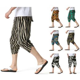 Pantaloni Pantaloni di lino in cotone da uomo larghi giapponesi Pantaloni estivi maschili nuovi pantaloni corti di lino con stampa traspirante Fitness Streetwear