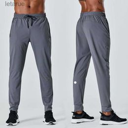 Broeken LL-herenbroeken Hardlopen Sport Ademende broeken Volwassen sportkleding Gymtraining Fitnesskleding Sneldrogend Elastisch Trekkoord Lange broek 240308