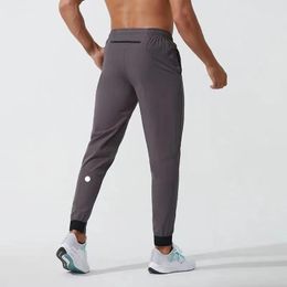 Pants lulu Pantalons pour hommes Tenue de yoga LongJogger Sport Tenue de yoga Séchage rapide Cordon de serrage Poches de sport Pantalons de survêtement Pantalons Hommes Casual Élastique W