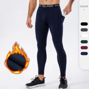 Pantalons Men Pantalon de compression automne Sports d'hiver Fitness Pantalage Running Pants Basketball Collages d'entraînement Gym Leggings avec poche