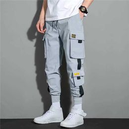 Pantalones Nuevo hip-hop jogger cargo harem Multi bolsillo cinta Deportes para hombres Street casual pantalones para hombres P230529