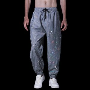 Pants Nouveaux hommes imprimé géométrique réfléchissant Jogger Sweapants pantalon Fluorescent Harajuku Hip Hop danse Festival Rave nuit Sport pantalon