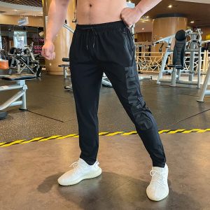 Broek sportpant voor mannen runnen fitness joggers snel droge zomer ijs zijden elastische gym oefening ritszakken trainingsbroek