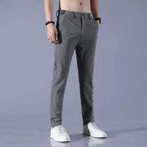 Pantalon printemps et automne hommes taille haute bouton fermeture éclair couleur unie poche Sport Harun Tube droit vêtements de travail mode pantalons décontractés