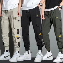 Pantalon mince streetwear pantalon décontracté pour hommes rubans harem jogging pantalon mâle slim fit pantalon cargo de cargaison multipocket femmes pantalon