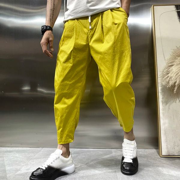 Pantalon jaune décontracté harlan pantalon hommes corée de mode streetwear de mode harajuku pantalon lâche solide pantalon de survêtement sauvage massif du jogging pantalon noir