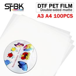 Papier 100 PCS Transférer du papier pour A3 A4 L805 L1800 P400 R1390 DTF Tshirt Vêtements à encre blanche Transparente à double imprimante de film mate
