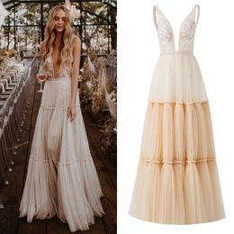 Partykleider 1333 Boho Deep Sexy V-Ausschnitt ärmellos rückenfrei Braut Strand Tüll Spitze bodenlang A-Linie Champagner Hochzeitskleid Kleid 230306