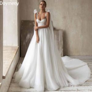 Feestjurken Doymeny Bridal Wedding Dress Court Train Vat Up Beading boog Backless mouwloze satijnen voortreffelijke Aline Luxuryrobe de 230427