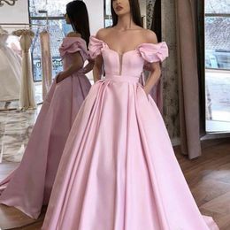 Feestjurken elegante dames roze off-schouder 2023 prom jurk met zakken puff mouwen a-lijn satijnen vloer lengte formele avondvestid