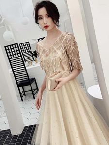 Robes de fête robe de soirée femelle 2024 Banquet de paillettes en or mode V
