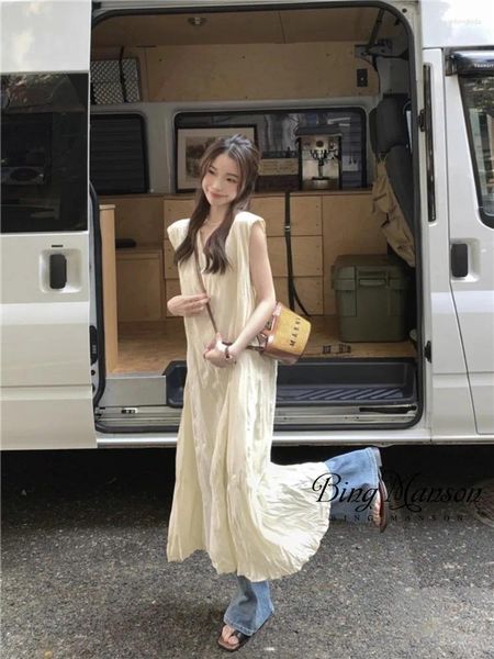 Robes de soirée à la mode coréenne femmes col en V lâche et mince couleur unie tempérament plissé jupe longue simple robe sans manches décontractée