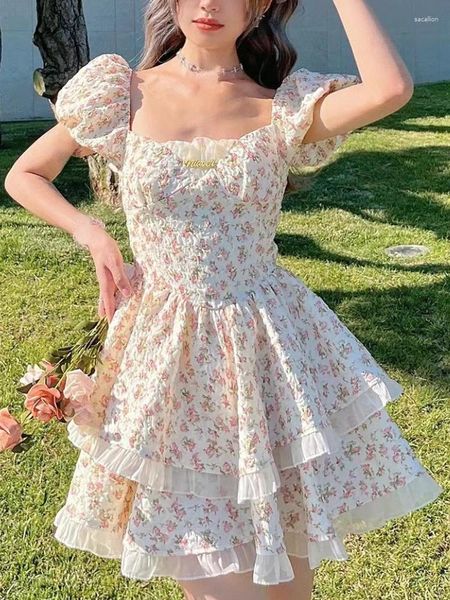 Robes de fête imprimées fleur kawaii robe douce femme creux de français vintage mini designer coréen de papillon femelle 2024
